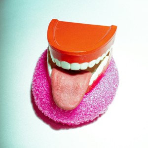 false teeth with a tongue sticking out